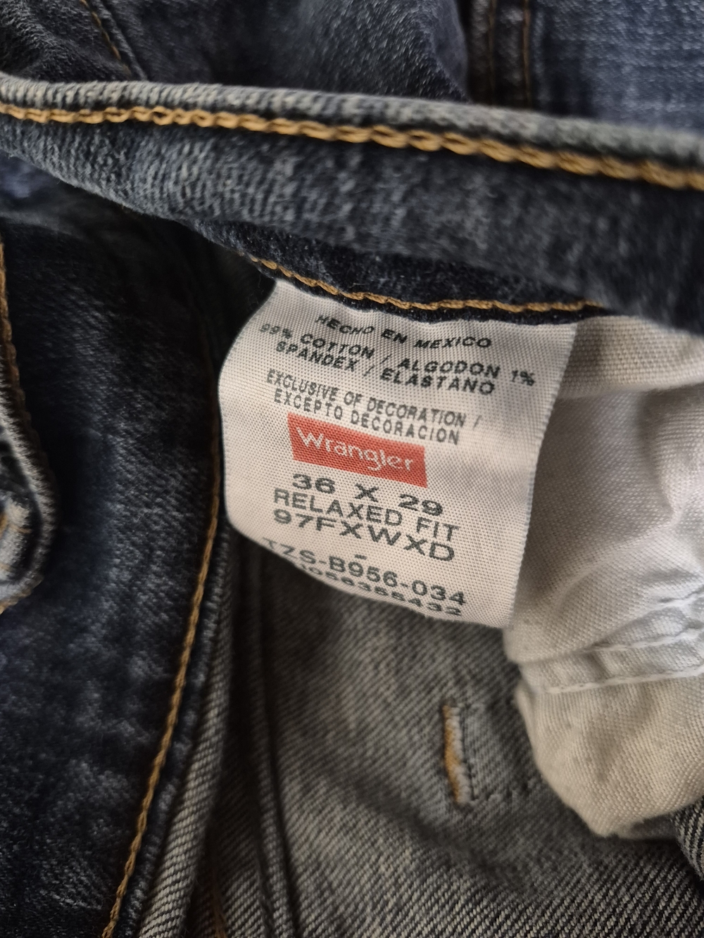 Wrangler Relaxed Fit Jeans in Dark Indigo with Gold Stitching